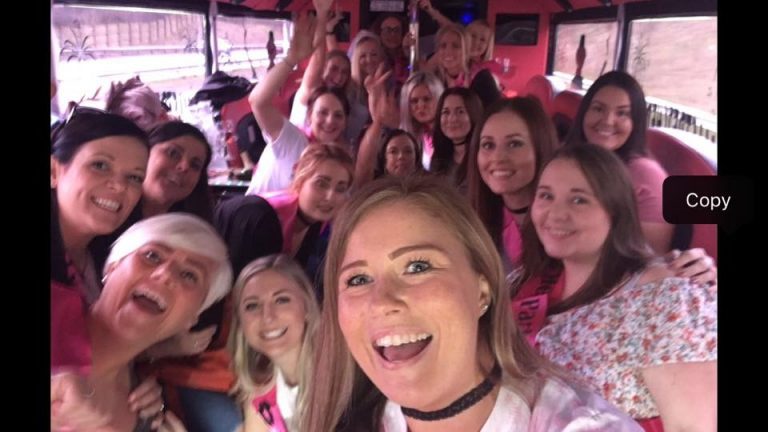 Ladies Group Selfie with joyful friends in All Stretched Out Party Bus