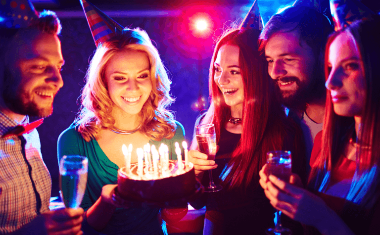 Birthday party with friends with a cake.